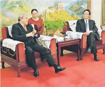  ??  ?? Awang Tengah (left) and Zhang (right) during their meeting in Beijing.