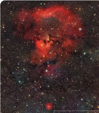  ?? ?? The Question Mark Nebula
The cosmic punctuatio­n comprises two objects: NGC 7762 is the question mark’s curvy part, and Sharpless 2–170 is the dot at the bottom. The red glow is caused by hydrogen gas ionized by nearby stars. This two-panel mosaic represents 6.3 hours of exposure with a Nikon D90 and a 300mm f/4.0 lens at ISO 800.