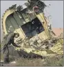  ??  ?? JET TRAGEDY: The wreckage of the Malaysia Airlines flight downed over the Ukraine.