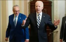  ?? Saul Loeb/AFP via Getty Images ?? President Joe Biden, with Senate Majority Leader Chuck Schumer, left, speaks to the press after meeting with the Senate Democratic caucus about his infrastruc­ture and economic investment goals Wednesday during the Democratic luncheon at the U.S. Capitol in Washington.