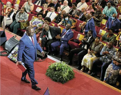 ?? Picture: Esa Alexander/Reuters ?? Finance minister Enoch Godongwana makes his way from the podium after delivering his 2024 budget speech in Cape Town on Wednesday.