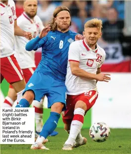  ??  ?? Kamil Jozwiak (right) battles with Birkir Bjarnason of Iceland in Poland’s friendly last week ahead of the Euros.