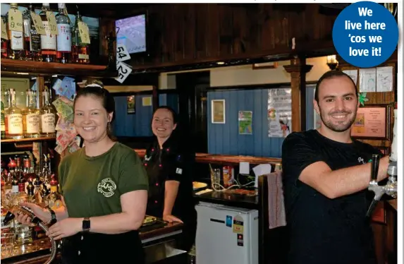  ?? Photo: Sean White ?? WORKING HARD: Busy during a lunch-time service at the Irish Club Hotel are (from left) Karli Hassall, Alesha Stone and Brandon Collins.