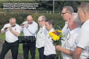  ??  ?? Derek Moore (left) and fellow members of the William King Memorial Flute Band play at the grave of band founder William King (right)