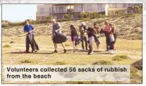  ??  ?? Volunteers collected 56 sacks of rubbish from the beach