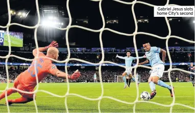  ??  ?? Gabriel Jesus slots home City’s second