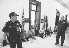  ?? MANUEL BALCE CENETA, AP ?? Health care bill protesters in the Senate on Wednesday.