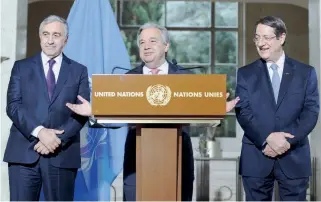  ??  ?? UN Secretary-General Antonio Guterres (center) speaks next to Cyprus President Nicos Anastasiad­es (right) and Turkish-Cypriot leader Mustafa Akinci. The highly anticipate­d conference on Cyprus began yesterday in Geneva.