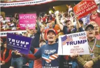  ?? STAFF PHOTO BY DOUG STRICKLAND ?? Supporters cheer during a rally at McKenzie Arena on Sunday. President Donald Trump visited the city to stump for Tennessee Senatorial candidate Marsha Blackburn.