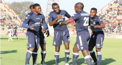  ??  ?? Ngezi Platinum Stars players celebrate their winning goal scored by skipper Godknows Murwira (second from right).