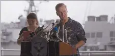  ?? Associated Press ?? Vice Adm. Joseph Aucoin, right, Commander of the U.S. 7th Fleet, speaks during a press conference near the damaged USS Fitzgerald, rear, at the U.S. Naval base in Yokosuka, southwest of Tokyo on Sunday.