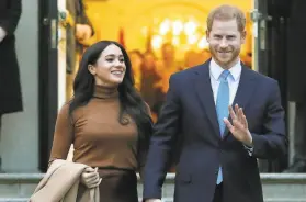  ?? Frank Augstein / Associated Press 2020 ?? Prince Harry and Meghan visit Canada House last year in London. The Duke and Duchess of Sussex stepped away from fulltime royal life in early 2020.