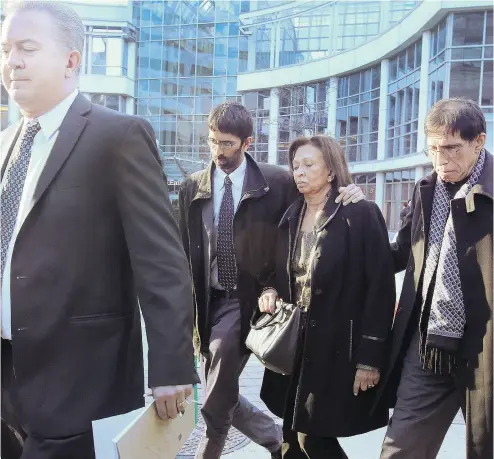  ?? VERONICA HENRI / POSTMEDIA NEWS ?? Lawyer Liam O’Connor, left, and relatives of Mohammed Shamji, 40, a Toronto neurosurge­on, leave Old City Hall in Toronto on Friday after Shamji’s first court appearance. He is charged with first- degree murder in a woman’s death.