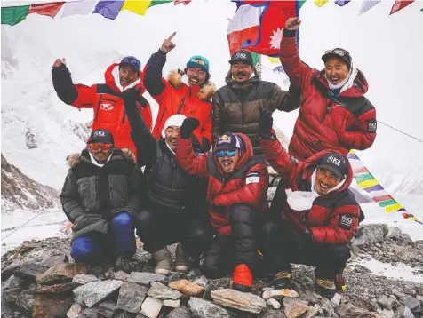  ?? — REUTERS FILES ?? Nirmal Purja, Dawa Tenji Sherpa, Mingma G, Dawa Temba Sherpa and Pem Chiri Sherpa, Mingma David Sherpa, Mingma Tenzi Sherpa, Nimsdai Purja and Gelje Sherpa before their ascent on K2.