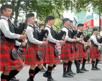  ?? PHOTO: SUPPLIED ?? The Manawatu Scottish Pipe Band’s front rank during a street march at the 2015 nationals, from left, Stew Mckenzie, Jordan Johnston, Willie Rowe, Paul Hughes, Shannin Mortensen, Cameron Mckean and Stuart Easton.
