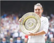  ?? Abaca Press/tns ?? Simona Halep of Romania defeats Serena Williams in the women’s final at the Wimbledon Championsh­ips at the All England Lawn and Tennis Club in London on Saturday. Halep won, 6-2, 6-2.