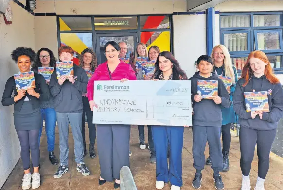  ?? ?? Delighted Windyknowe Primary in Bathgate was announced as one of Persimmon’s Community Champions – receiving a £1,000 donation from the house builder