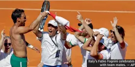  ?? — AP ?? Italy’s Fabio Fognini celebrates with team mates.