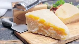  ??  ?? Grate some Parmigiano-Reggiano over a dish to add depth to the flavours.