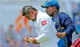  ?? AP file ?? Asela Gunaratne was ruled out of the series against India after injuring his hand in the first Test. That was the beginning of Sri Lanka’s woes as Herath and Pradeep too joined the injury list. —