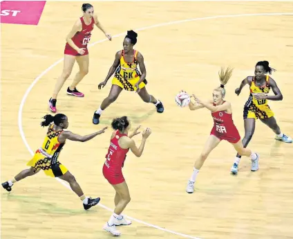  ??  ?? Clean sweep: England’s Helen Housby (second right) in action against Uganda during a series in which they won 3-0