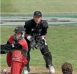  ??  ?? Andy Flower is the batsman, Daniel Vettori the bowler and Adam Parore the wicketkeep­er during a Zimbabwe tour.