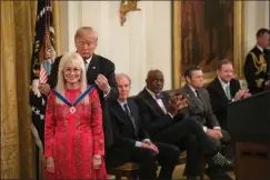  ?? Official White House Photo by Amy Rossetti ?? President Trump presents Miriam Adelson, Jewish philanthro­pist, with the Presidenti­al Medal of Freedom during a ceremony at White House on Friday.