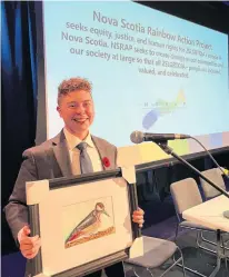  ?? KASTIN BRADLEY ?? Columnist Charlie Johnson recently accepted a special media honour. The Raymond Taavel Media Award was given by the Nova Scotia Rainbow Action Project to recognize Johnson and Saltwire Network for educating the public on news or issues affecting the 2SLGBTQIA+ community.