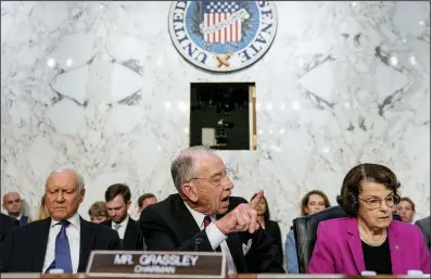  ?? AP/ANDREW HARNIK ?? Invoking the “Ginsburg rule,” Senate Judiciary Committee Chairman Charles Grassley said it would be “unfair and unethical” for Supreme Court nominee Brett Kavanaugh to answer questions about specific cases. Sen. Dianne Feinstein (right) questioned the nominee’s true stand on Roe v. Wade.