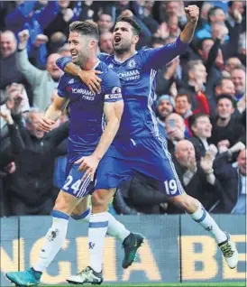  ?? REUTERS PHOTO ?? Gary Cahill (left) scored Chelsea’s second goal against Manchester United on Sunday.