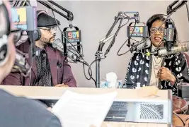  ?? EMILY CURIEL ecuriel@kcstar.com ?? Mark Manning, host of KKFI Community Radio’s Wednesday MidDay Medley show, recently interviewe­d J.M. Banks, left, The Star’s culture and identity reporter, and Mará Rose Williams, assistant managing editor of race and equity. The two talked about the new season of Voices of Kansas City.