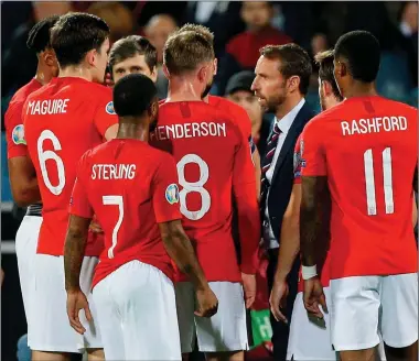  ??  ?? SOLIDARITY: Southgate and his England heroes showed honour and style in Sofia