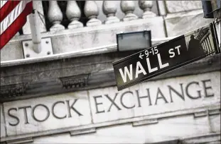  ?? MARK LENNIHAN / AP ?? Georgia bankers’ weakest spots in 2016 were loans to businesses, which grew by less than 2 percent, and municipal government­s, which declined by almost 9 percent. Credit card balances and other individual loans, on the other hand, soared by almost 15...