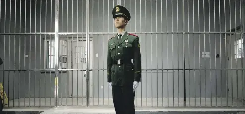  ?? ED JONES / AFP / GETTY IMAGES ?? The main gate to China’s No.1 Detention Center during a government guided tour in Beijing in 2012.