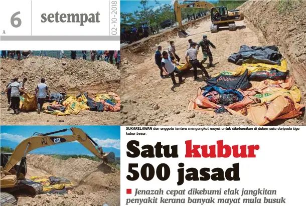  ??  ?? SUKARELAWA­N dan anggota tentera mengangkat mayat untuk dikebumika­n di dalam satu daripada tiga kubur besar.