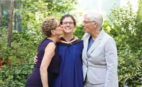  ?? JENNA MUIRHEAD-GOULD/COURTESY PREMIER’S OFFICE ?? Premier Kathleen Wynne and partner Jane Rounthwait­e, right, congratula­te Wynne’s daughter Maggie Cowperthwa­ite at her graduation on Friday.