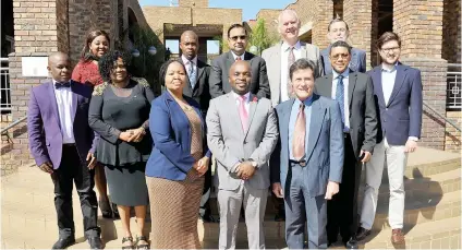  ?? Picture: Michel Bega ?? NEW BROOMS. Tshwane Mayor Solly Msimanga, centre, poses with the Tshwane speaker Katlego Matheba, front left, and chief whip Christian van den Heever, front right, alongside his other appointed members of the mayoral council yesterday at the Council...