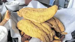  ?? Photos by J.C. Reid / Contributo­r ?? Fried catfish at Ray’s BBQ Shack