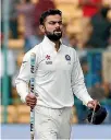  ??  ?? Virat Kohli may not be fit to play in the fourth and deciding test against Australia.