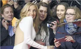  ??  ?? In the picture… British director Sam Taylor- - Johnson poses with fans