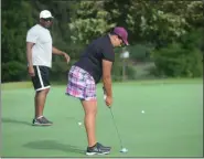  ?? TANIA BARRICKLO-DAILY FREEMAN ?? Amber Pennington practices her putting at Wiltwyck Golf Club on Friday. Heading into the final round of the Ulster County Women’s Golf Associatio­n championsh­ip, Pennington held a 10-shot lead.