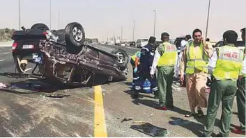  ?? Courtesy: Dubai Police ?? The scene of the fatal accident on Shaikh Mohammad Bin Zayed Road in front of Silicon Oasis in Sharjah direction on Friday. A girl died and four other passengers in the vehicle were injured.