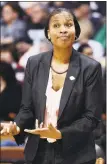  ?? Jessica Hill / AP ?? Former Cincinnati coach Jamelle Elliott is happy to be back working in Storrs.