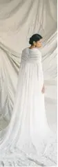  ?? NORDEEN ?? A wedding dress with ruched tulle.