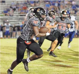  ?? Keith Deal ?? Jamario Clements and the LaFayette Ramblers show off their specialty jerseys during Military Appreciati­on Night this past Friday, Sept. 11.