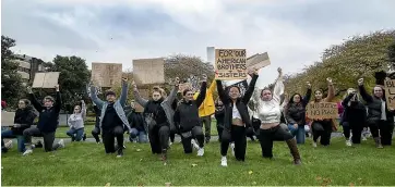  ?? PHOTOS: WARWICK SMITH/STUFF ?? Palmerston North people rally for Black Lives Matter in The Square. Habin Choi, centre and holding placard, is the organiser of the rally.