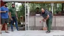  ??  ?? Indian nationals play cricket while waiting in quarantine in Serbia