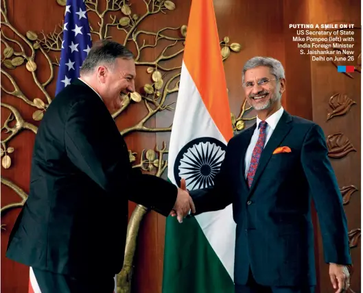  ?? JACQUELYN MARTIN/AFP/GETTY IMAGES ?? PUTTING A SMILE ON IT US Secretary of State Mike Pompeo (left) with India Foreign Minister S. Jaishankar in New Delhi on June 26