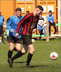  ??  ?? Leighton Gleeson of Courtown Hibs chases Stephen Moloney of Gorey Rangers during the Wexford Volkswagen Cup semi-final.