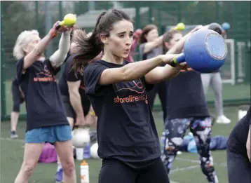  ??  ?? Ashley Cregan taking part in the Shoreline Bray 1000 Kettlebell Challenge for Laura Lynn.